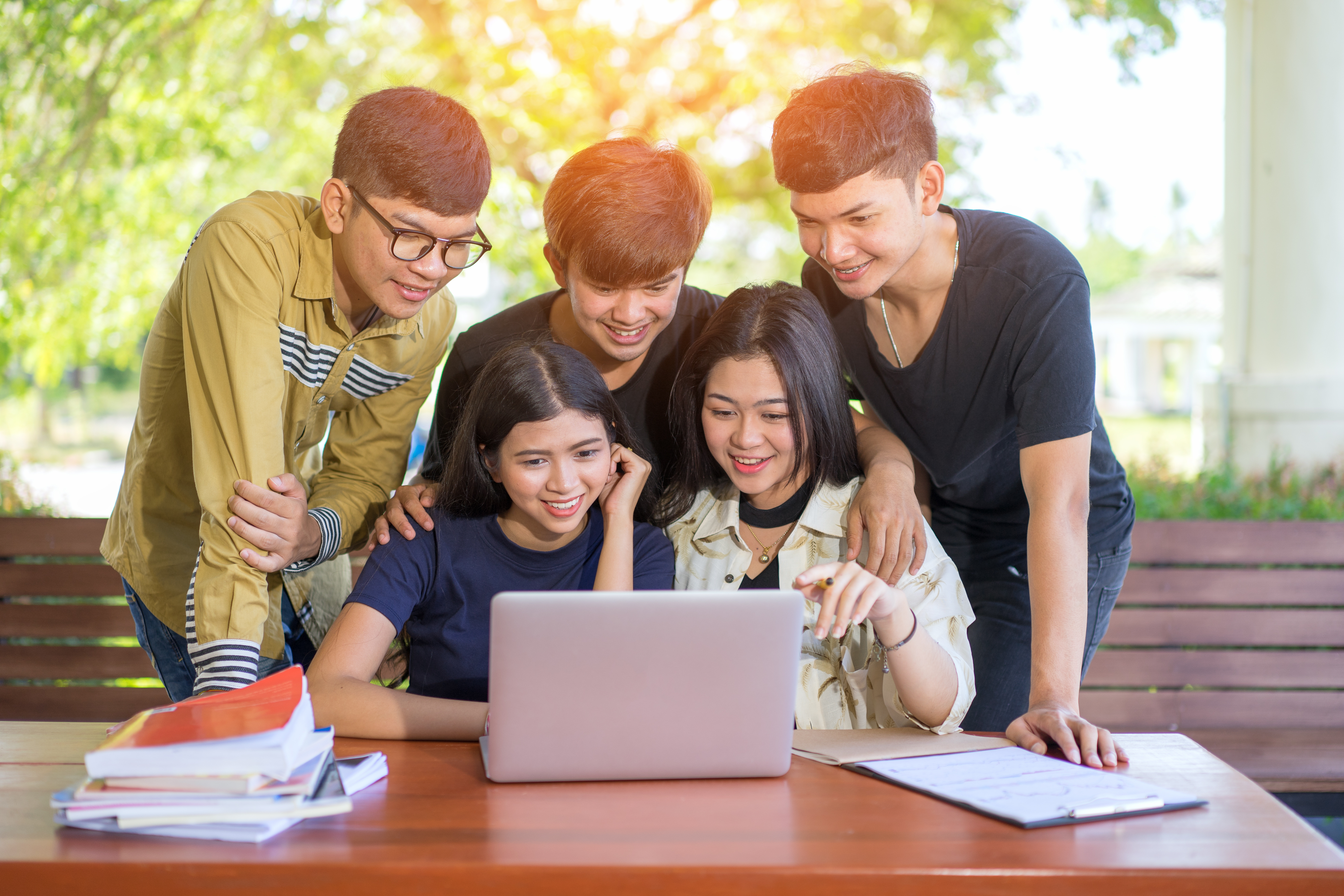 lady chcking on tablet while drinking